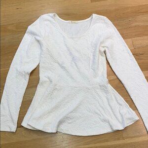 White textured long sleeve peplum top
